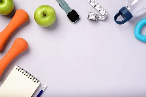 Top view exercise stuff on patel purple table for healty lifestyle Stock-Fotos