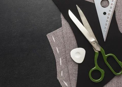 Top view fabrics with notebook thread Stock Photos