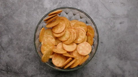 Top view falling Biscuits Cookies into a bowl, Slow motion. Stock Footage 157411928