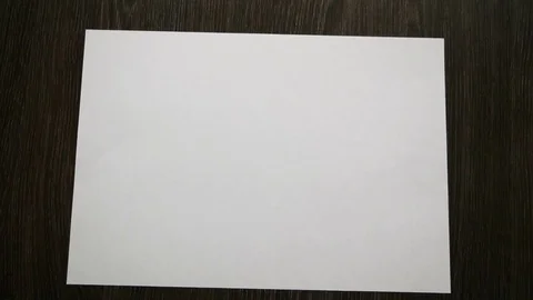 Top view of falling blank white sheet. Close up Stock-Footage 84593625