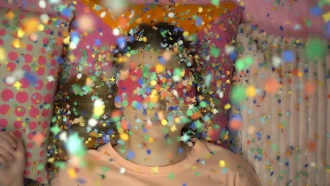 Top view falling colorful confetti on the beautiful girl in slow motion. Stock Footage 101000149
