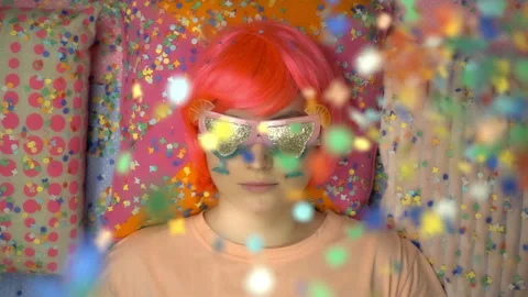 Top view falling colorful confetti on the beautiful girl in slow motion. Stock Footage 101000234