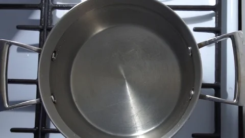 TOP VIEW: Falling pile of pasta cuts, slow motion. Pasta penne in boiling water Stock Footage 101739421