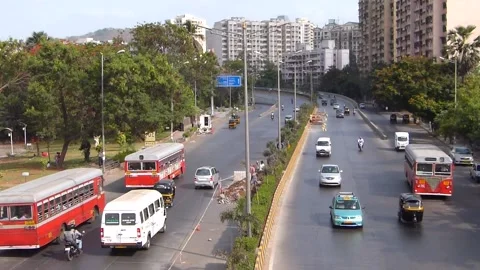 Top View of fast moving road traffic, Powai Lake Mumbai city Maharashtra India Stock Footage 232576487