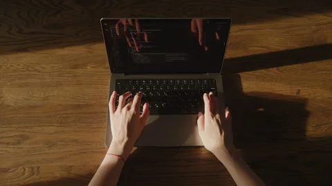 Top View Female Arms Coding on Laptop Stock Footage 256204762