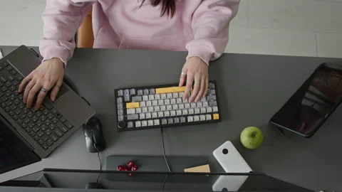 Top View of Female Developer Working on Code on Multiple Devices Stock-Footage 335939082