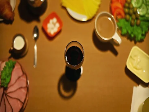 Top view female hand taking a glass of wine from bottom Stock Footage 73258275