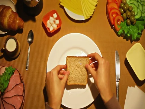 Top view female hands making open face sandwich for breakfast Stock Footage 73256082
