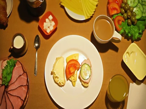 Top view female hands taking a glass of fruit juice for breakfast Stock-Footage 73258326