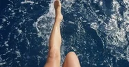 Top View Female Legs In Water Woman Splashing And Playing With Feet In Ocean Off Stock Footage