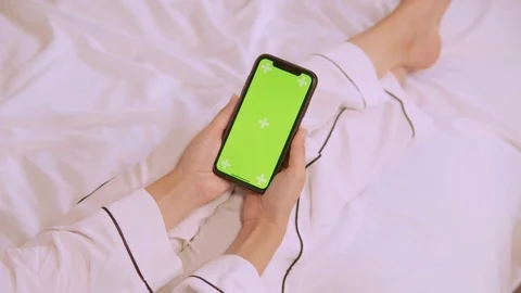 Top view female typing messaging use mobile in bedroom in the morning Stock Footage 125947812