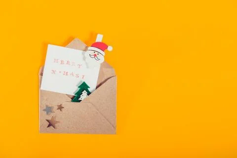 Top view festive composition with handmade stamp greeting card, santa clause  Foto stock