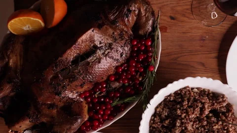 Top view of festive roasted goose served with cranberries, oranges and buckwheat Stock Footage 326106872