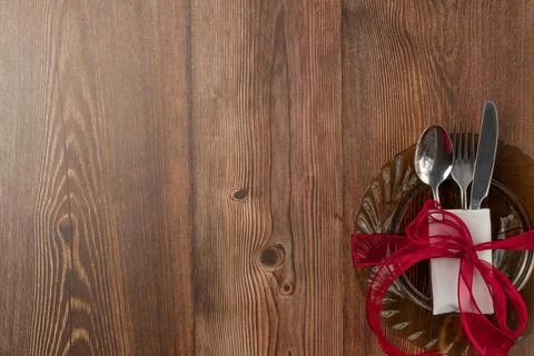 Top view of festive table setting on wood background. Space for text Stock Photos