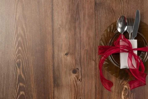 Top view of festive table setting on wood background. Space for text Stock Photos