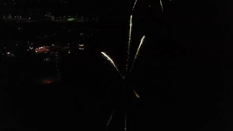 Top view of the fireworks on the background of city lights Stock Footage 139917431