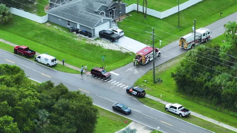 Top view of first responders at accident site on american street. Emergency Stock Footage 242481041