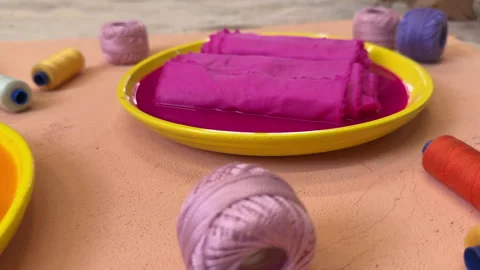 Top view of flasks with dyed fabrics in bright colors fabric master class concep Vídeo Stock 306210494
