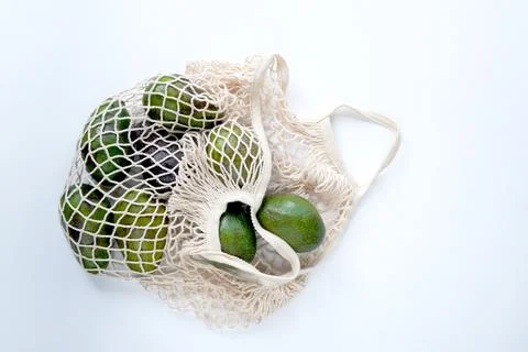 Top view of flat composition, avocado on light background. Stock Photos