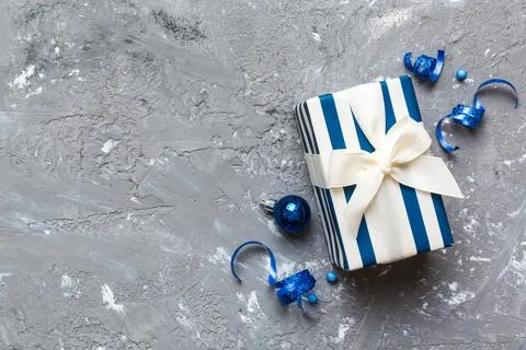 Top view Flat lay Christmas decorations and gift box on colored background wi Stock Photos