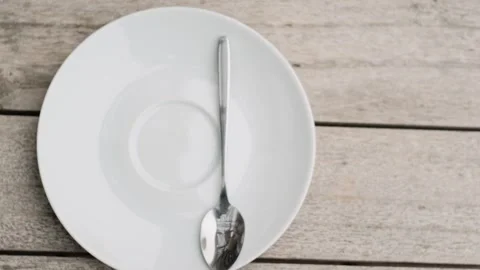 Top view flat lay of a cup of hot coffee Video stock 328102856