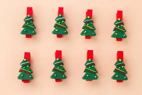 Top view flat lay festive red clothespins decorated with christmas tree on a  Stock Photos