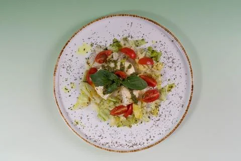 Top view flat lay of gourmet caprese salad with mozzarella cheese, Foto stock