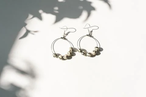 Top view flat lay hand-made earrings Stock Photos