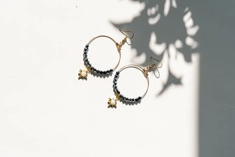 Top view flat lay hand-made earrings Stock Photos