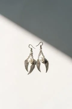 Top view flat lay hand-made earrings Stock Photos