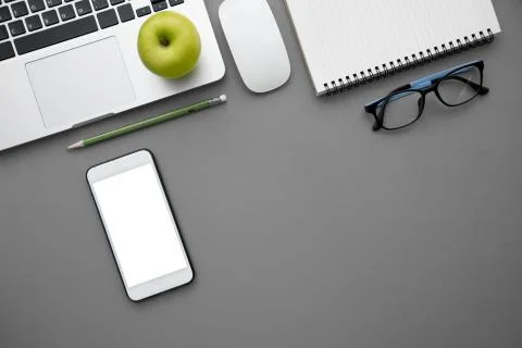 Top view, flat lay of Modern yellow office desk table with laptop Stock Photos