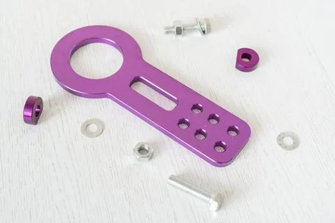 A top view of flat lay of new car part towing hook isolated Stock Photos