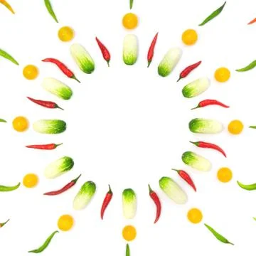 Top view flat lay over vegetables laid out in the form of a clock on a white  Stock Photos