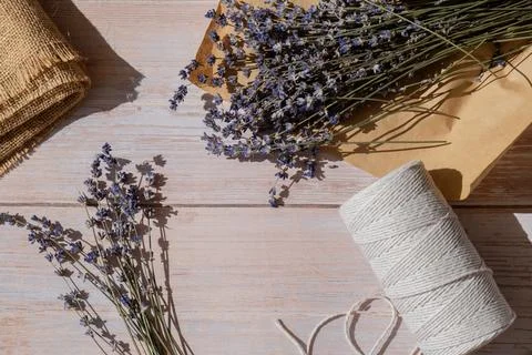 Top view flat lay of process making bouquets of dried lavender flowers. Cotton 写真素材