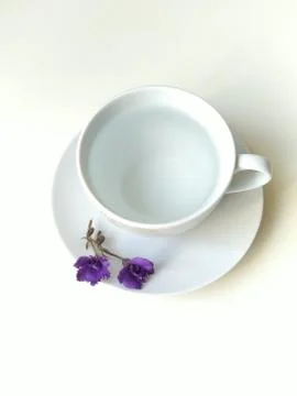Top view, flat layout, white coffee Cup with purple bells Stock Photos