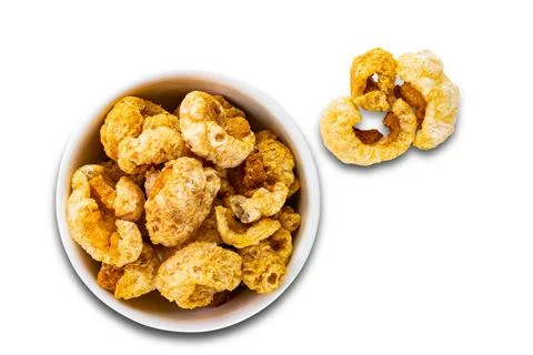 Top view (flat ray) of crispy homemade delicious deep fried pork rinds in w.. Stock Photos