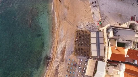 Top view of a flight over a beach with pear, aerial shot. Montenegro Stock Footage 83889306