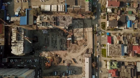 Top view fly over the construction site, crane, buildings Stock Footage 105923779