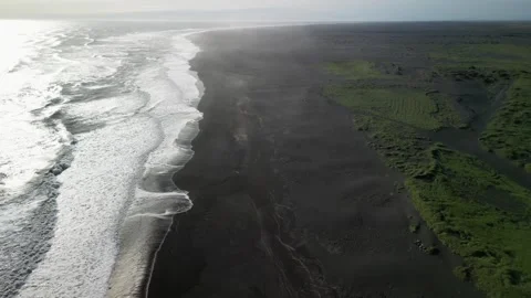 Top view flying drone of amazing nature view Black Sand Beach, Iceland Stock Footage 253723614