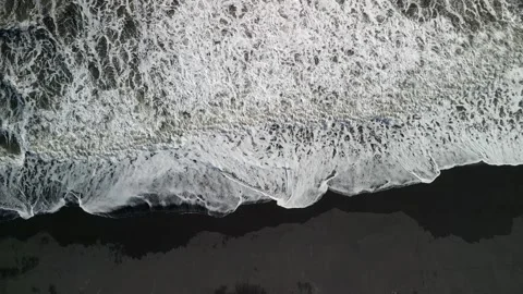 Top view flying drone of amazing nature view Black Sand Beach, Iceland Stock Footage 253723692