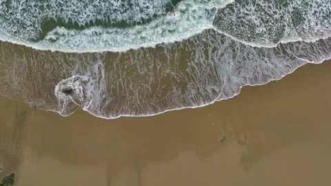 Top View Of Foamy Ocean Waves Washing Beach - Drone Shot, Slow Motion Stock Footage 264636326