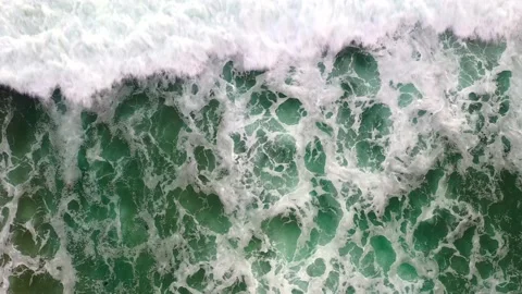 Top View Of The Foamy Waves Crashing At ... | Stock Video | Pond5