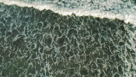 Top view of foamy waves on the ocean surface off the coast of Yucatan Mexico Stock Footage 315434720