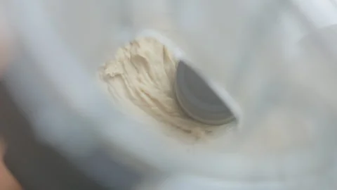 Top View of Food Processor Blending Smooth and Creamy Hummus Paste 스톡 동영상 326642951