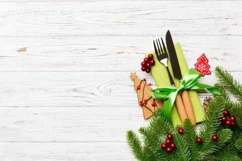 Top view of fork and knife on napkin with christmas decorations and new year  Stock Photos