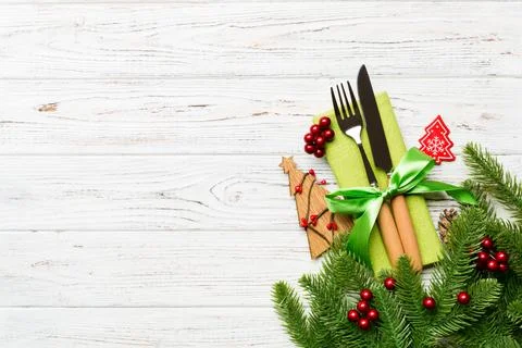 Top view of fork and knife on napkin with christmas decorations and new yea.. Stock Photos