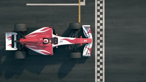 Top view of a formula one race car driving over finish line in slow motion Stock Footage