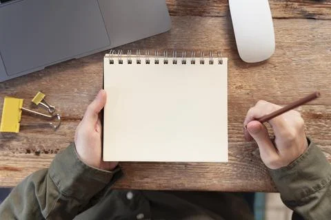 Top view freelancer taking notes. High quality and resolution beautiful pho.. Stock Photos