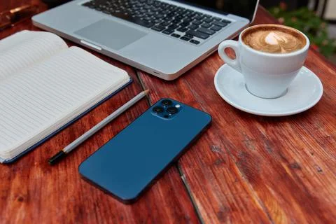 Top view of a freelancer workspace in a cafe Stock Photos