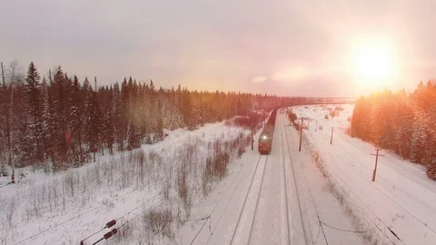 Top view of freight train with carriages on railways at winter Stock Footage 70345188